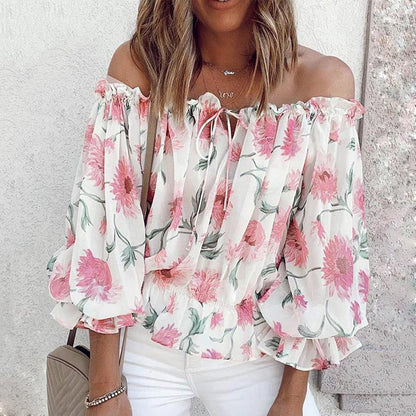 Blusa con volantes en las mangas y flores