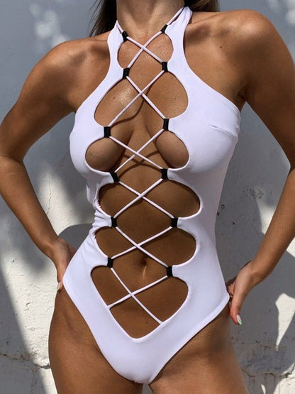 Traje de baño de una pieza con cuello halter calado y nudo romano