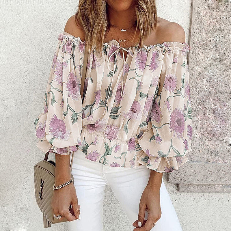 Blusa con volantes en las mangas y flores