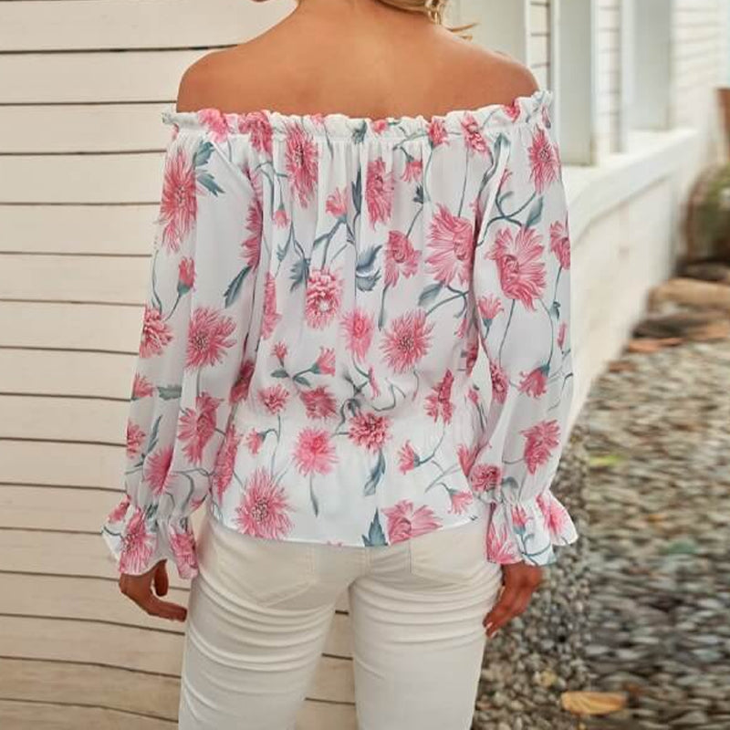 Blusa con volantes en las mangas y flores