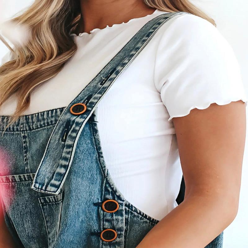 Loose fit distressed denim jumpsuit