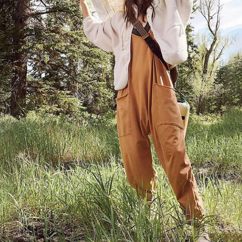 Mono de Color sólido con escote en V y bolsillo tipo saco.