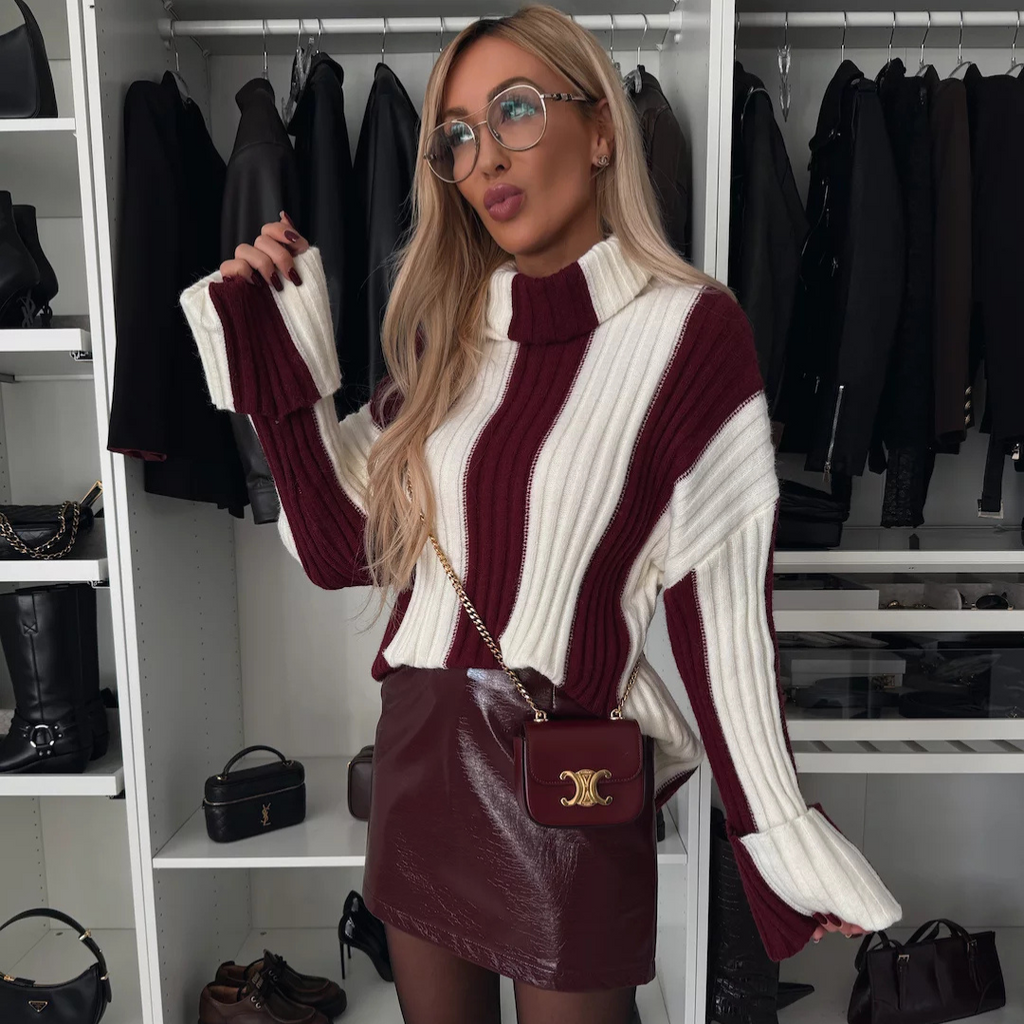 Suéter de cuello alto de punto a rayas